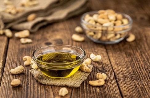 Portion of Cashew Oil (detailed close up shot, selective focus)