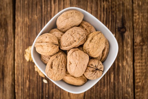 Portion of fresh Walnuts (close-up shot, selective focus)