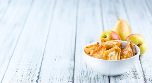 Dried Pears (selective focus) on an old wooden table