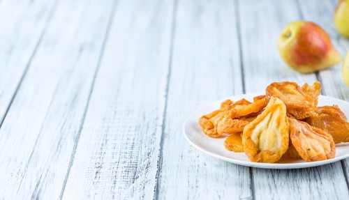 Bowl with dried Pears (close-up shot, selective focus)
