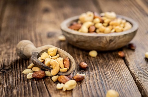 Portion of roasted nuts as detailed close up shot (selective focus)
