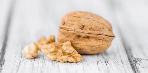 Portion of fresh Walnuts (close-up shot, selective focus)