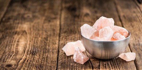 Portion of pink himalayan Salt (detailed close-up shot, selective focus)