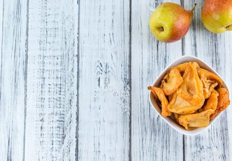 Bowl with dried Pears (close-up shot, selective focus)