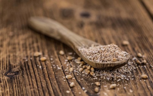 Fresh Wheat Bran as detailed close-up shot (selective focus)