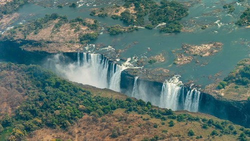 Victoria Falls at drought near Livingstone, Zimbabwe, as aerial shot made from a helicopter, Africa