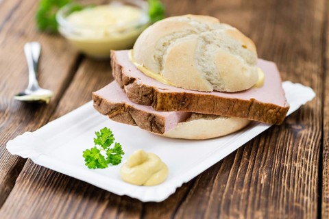 Homemade Meat Loaf on vintage background (selective focus, close-up shot)