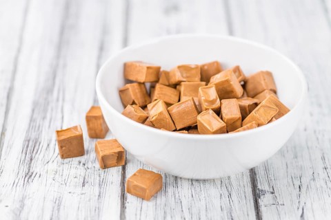 Portion of fresh Caramel (close-up shot, selective focus)
