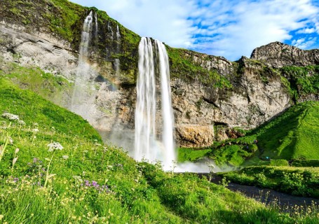 Seljalandsfoss waterfall in south Iceland during a sunset