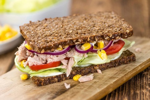 Fresh made Tuna sandwich with wholemeal bread (selective focus, close-up shot)