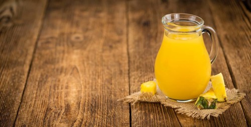 Some homemade Pineapple Juice as detailed close-up shot, selective focus
