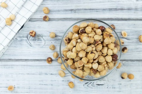 Hazelnut kernels as detailed close up shot (selective focus)