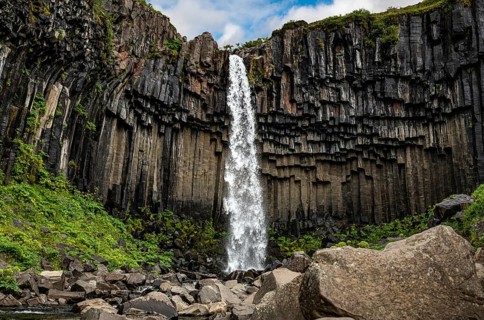 Svartifoss waterfall in the Skaftafell National Park Iceland during a summer day