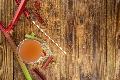 Portion of fresh made Rhubarb Juice (close up shot, selective focus)