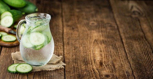 Homemade Cucumber Water on vintage background selective focus, close-up shot