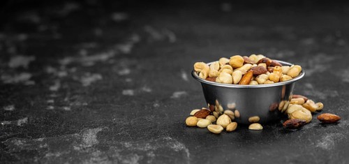 Portion of roasted nuts as detailed close up shot (selective focus)
