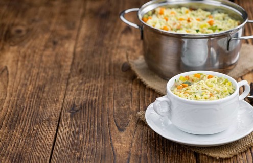 Portion of homemade Alphabet Soup (selective focus, close-up shot)