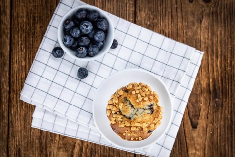 Some fresh Blueberry Muffins (selective focus, close-up shot)