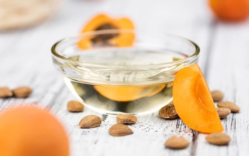 Apricot Kernel Oil as detailed close up shot (selective focus)