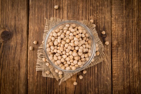 Portion of fresh Chickpeas close-up shot, selective focus