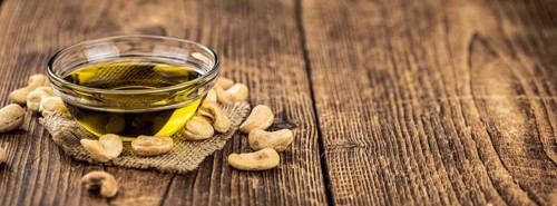 Portion of Cashew Oil (detailed close up shot, selective focus)