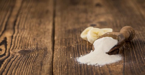Banana Powder on a vintage background as detailed close-up shot, selective focus