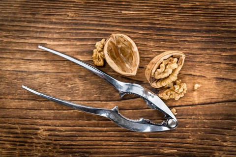 Walnuts on a vintage background as detailed close-up shot (selective focus)