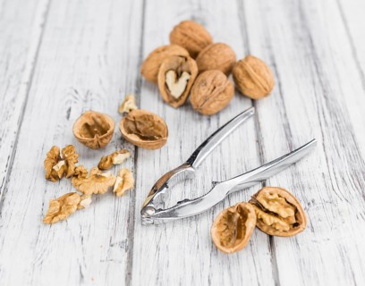 Walnuts on a vintage background as detailed close-up shot (selective focus)