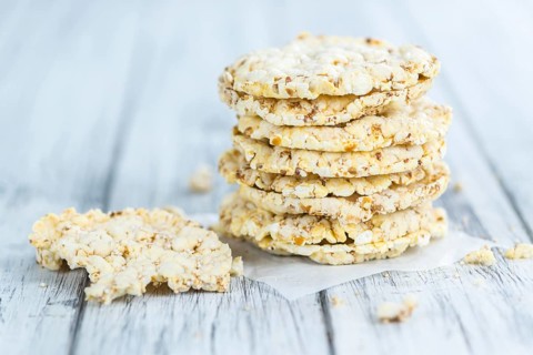 Portion of Corn Waffles (selective focus, close-up shot) on wooden background