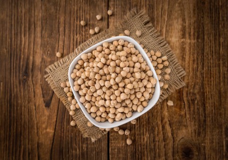 Portion of fresh Chickpeas close-up shot, selective focus