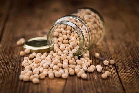 Portion of fresh Chickpeas close-up shot, selective focus