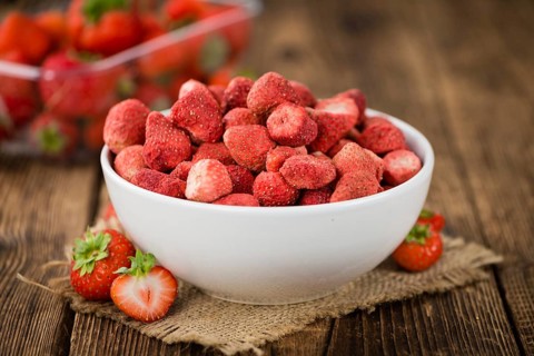 Dried Strawberries on a vintage background as detailed close-up shot, selective focus