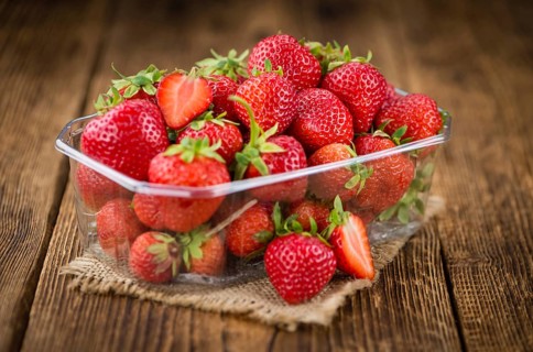 Portion of fresh Strawberries close-up shot, selective focus