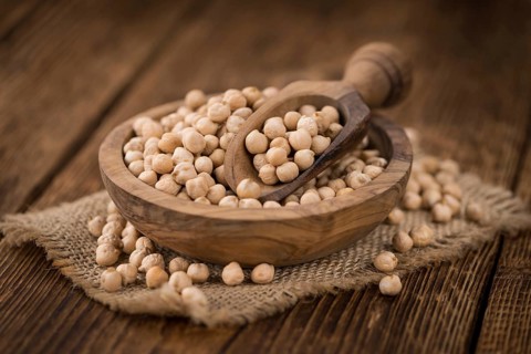 Portion of fresh Chickpeas close-up shot, selective focus