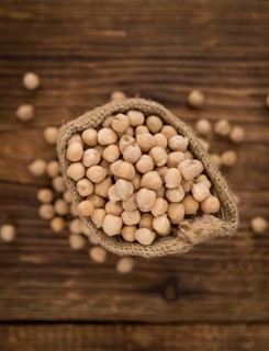 Portion of fresh Chickpeas close-up shot, selective focus