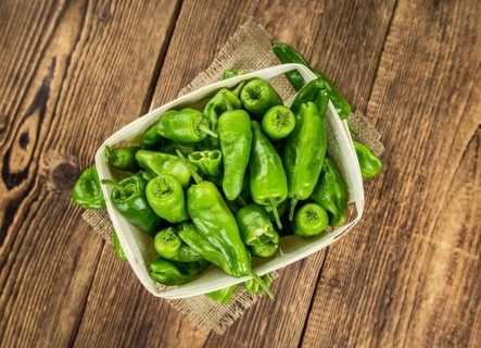 Portion of fresh Raw Pimientos close-up shot, selective focus