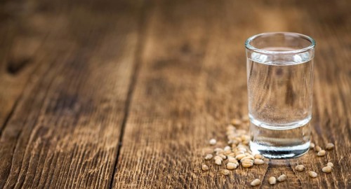 Portion of Wheat Liqueur as detailed close-up shot, selective focus