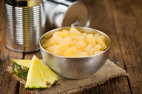 Portion of fresh Preserved Pineapple pieces close-up shot, selective focus