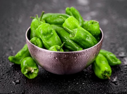 Portion of fresh Raw Pimientos close-up shot, selective focus