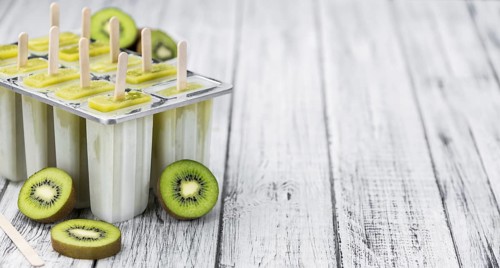 Kiwi Popsicles (fresh) as detailed close-up shot, selective focus)