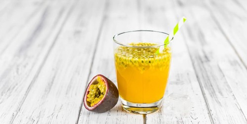Some healthy Maracuja Juice (selective focus, close-up shot)