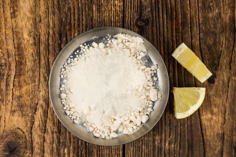Portion of healthy Lemon powder (selective focus, close-up shot)