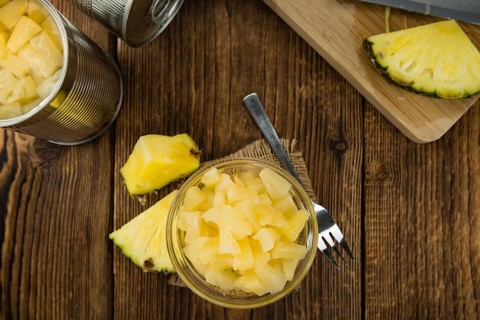 Portion of fresh Preserved Pineapple pieces close-up shot, selective focus