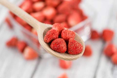 Dried Strawberries on a vintage background as detailed close-up shot, selective focus