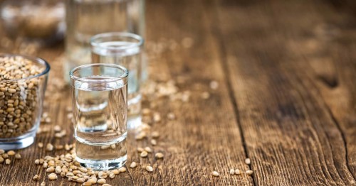Portion of Wheat Liqueur as detailed close-up shot, selective focus