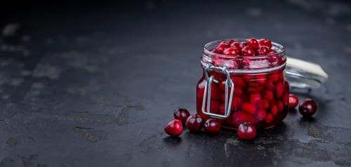 Portion of Preserved Cranberries as detailed close-up shot, selective focus