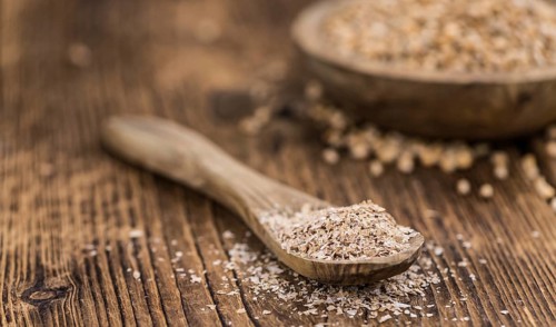 Portion of Wheat Bran as detailed close-up shot, selective focus