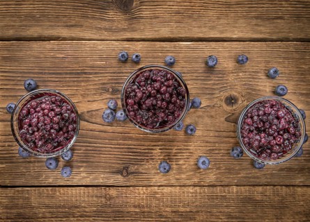 Fresh made Blueberries (preserved) on an old and rustic wooden table, selective focus, close-up