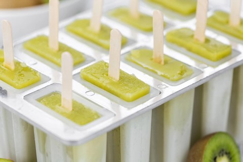 Kiwi Popsicles (fresh) as detailed close-up shot, selective focus)