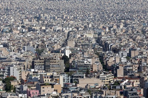 Sea of houses in a densely built-up metropolis, symbolic image of a concrete desert, Athens,